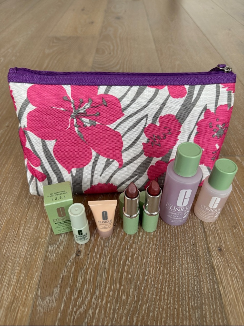 Clinique Pink Floral Cosmetic Pouch with Skincare & Lipsticks